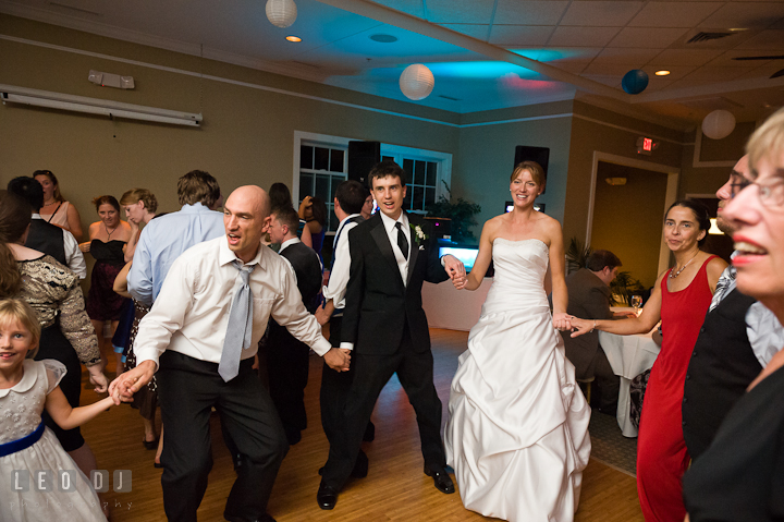 Bride and Groom dancing with their guests. Riverhouse Pavilion wedding photos at Easton, Eastern Shore, Maryland by photographers of Leo Dj Photography. http://leodjphoto.com