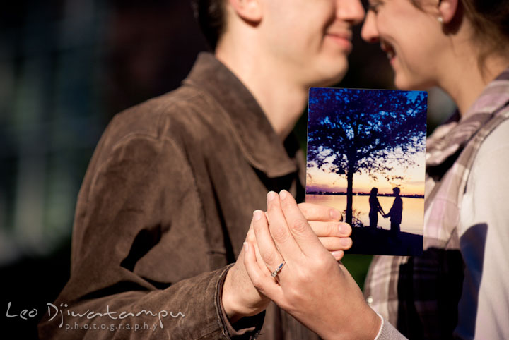 Engaged couple showing their silhouette sunset picture by a lake. Pre-wedding engagement photo session at Washington College and Chestertown, Maryland, by wedding photographer Leo Dj Photography.