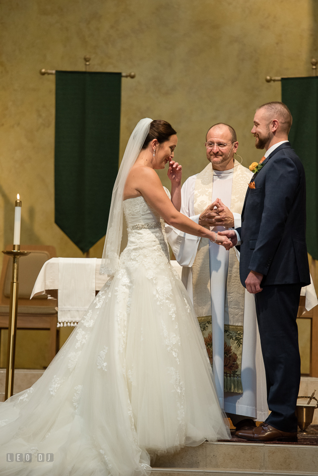 St Andrew by the Bay wedding ceremony Bride crying while reciting vow photo by Leo Dj Photography.