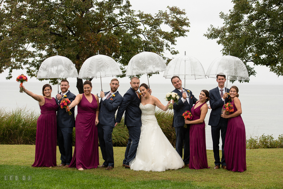 Chesapeake Bay Beach Club Bride and Groom with wedding party doing silly and fun pose photo by Leo Dj Photography.