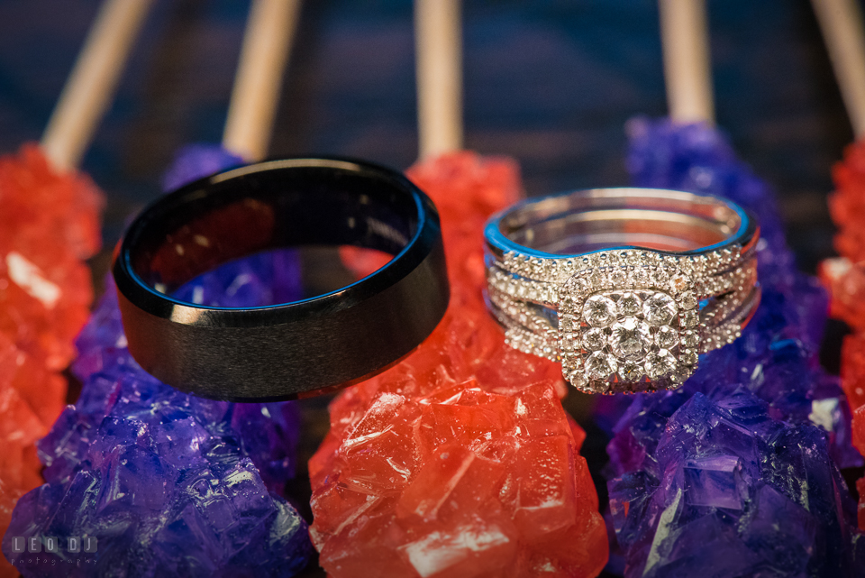 Chesapeake Bay Beach Club Bride and Groom wedding band and engagement ring on candies photo by Leo Dj Photography.