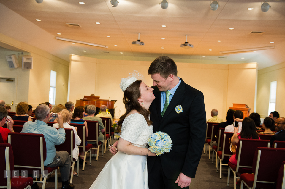 Bride and Groom almost kissed during recessional. Fisherman's Inn, Safe Harbor Church, Kent Island, Eastern Shore Maryland, wedding reception and ceremony photo, by wedding photographers of Leo Dj Photography. http://leodjphoto.com