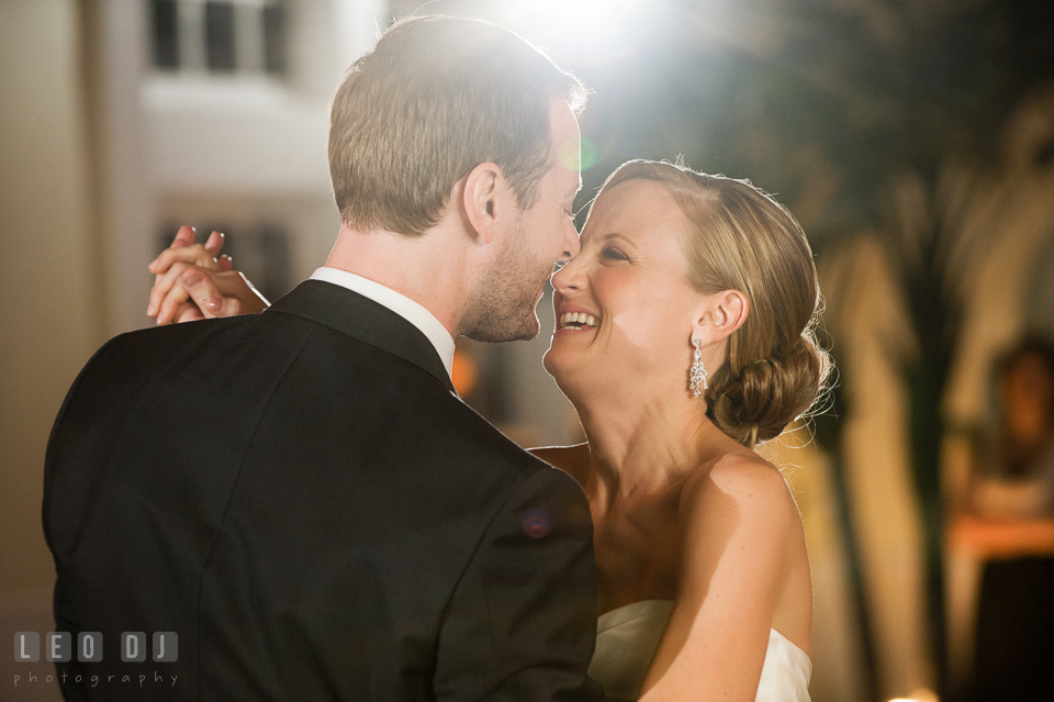 Bride and Groom laughing together during their first dance. Kent Island Maryland Chesapeake Bay Beach Club wedding photo, by wedding photographers of Leo Dj Photography. http://leodjphoto.com