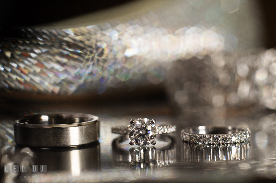 Close up macro shot of wedding bands and diamond engagement ring. Historic Inns of Annapolis Maryland, Governor Calvert House wedding, by wedding photographers of Leo Dj Photography. http://leodjphoto.com