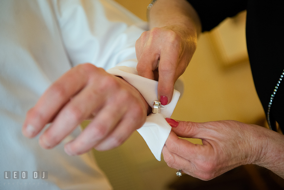 Mother of Groom helping put on cufflinks for groom. Historic Inns of Annapolis Maryland, Governor Calvert House wedding, by wedding photographers of Leo Dj Photography. http://leodjphoto.com