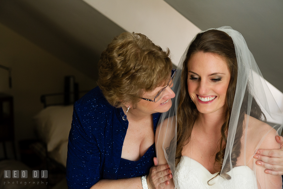 Mother of Bride smiling and hugging her daughter. Historic Inns of Annapolis Maryland, Governor Calvert House wedding, by wedding photographers of Leo Dj Photography. http://leodjphoto.com