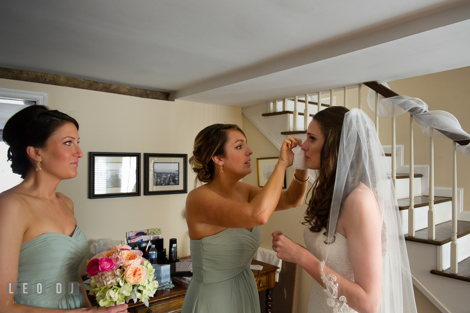 Bridesmaids helping Bride wipe of tears from her eyes. Historic Inns of Annapolis Maryland, Governor Calvert House wedding, by wedding photographers of Leo Dj Photography. http://leodjphoto.com