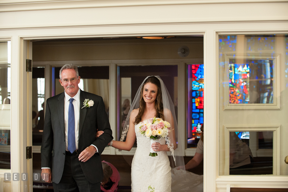 Bride escorted by Father of the Bride entered the sanctuary and saw Groom for the first time at Calvary United Methodist Church. Historic Inns of Annapolis Maryland, Governor Calvert House wedding, by wedding photographers of Leo Dj Photography. http://leodjphoto.com