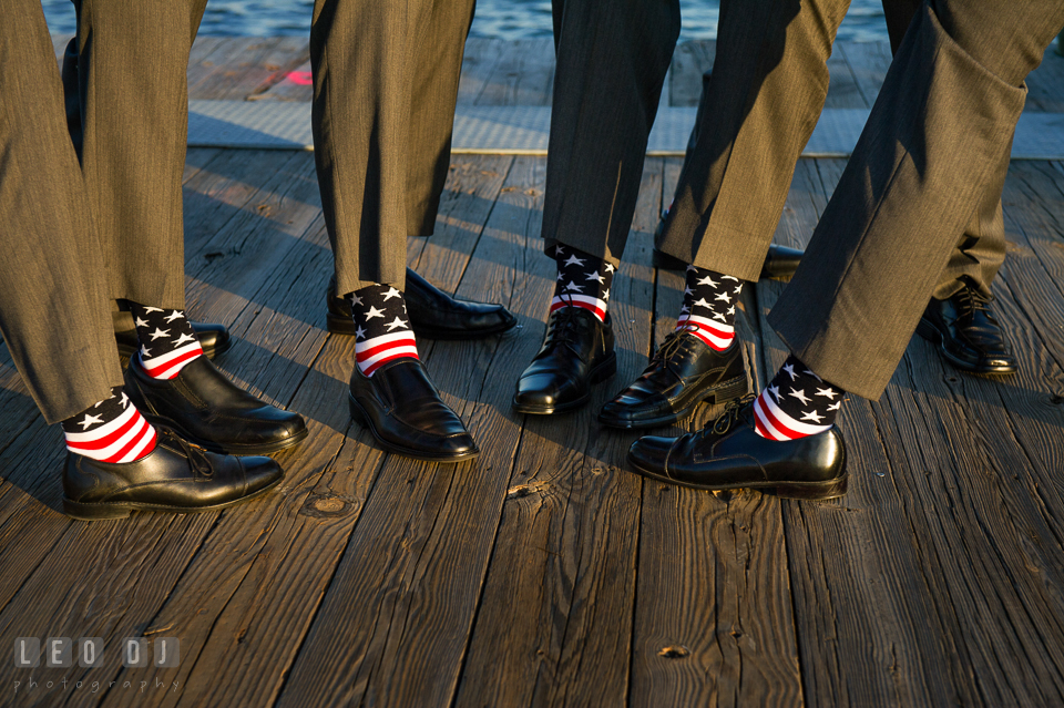 Groom and his groom's party wearing American flag pattern socks. Historic Inns of Annapolis Maryland, Governor Calvert House wedding, by wedding photographers of Leo Dj Photography. http://leodjphoto.com