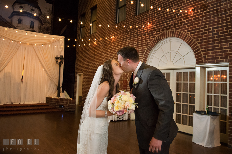 Bride and Groom kissed right after the introduction by the DJ from Beat2Beat DJ's. Historic Inns of Annapolis Maryland, Governor Calvert House wedding, by wedding photographers of Leo Dj Photography. http://leodjphoto.com