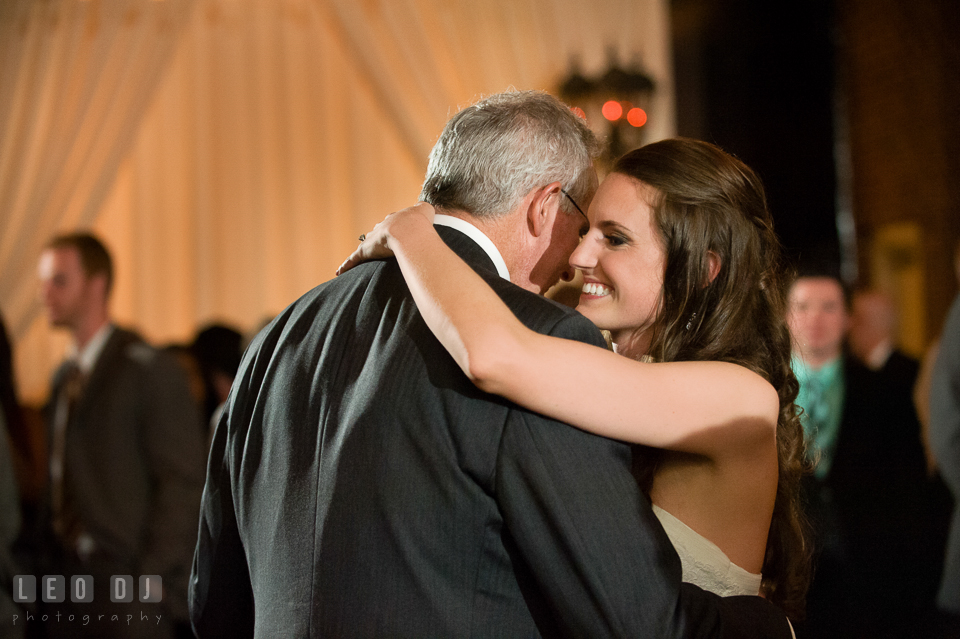 Bride smiling while dancing with Father during parent dance. Historic Inns of Annapolis Maryland, Governor Calvert House wedding, by wedding photographers of Leo Dj Photography. http://leodjphoto.com