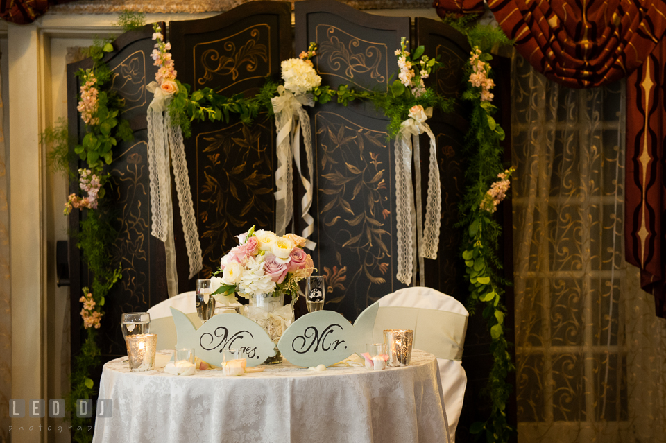 Sweetheart table for the Bride and Groom with a beautiful backdrop inside the Governor's Hall. Historic Inns of Annapolis Maryland, Governor Calvert House wedding, by wedding photographers of Leo Dj Photography. http://leodjphoto.com