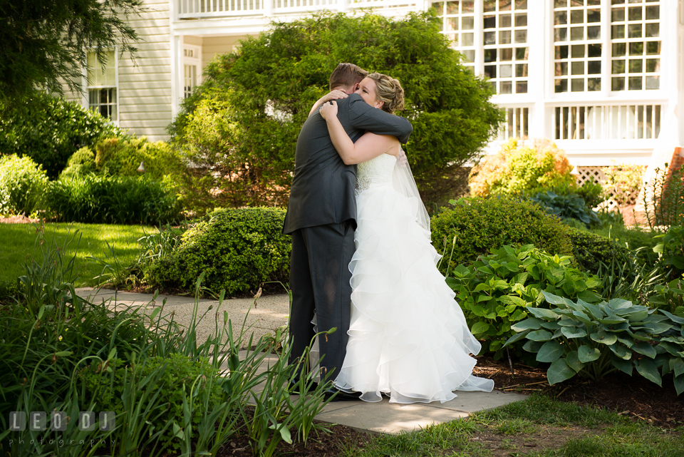 Bride and Groom hugging each other during first look. Kent Manor Inn, Kent Island, Eastern Shore Maryland, wedding ceremony and getting ready photos, by wedding photographers of Leo Dj Photography. http://leodjphoto.com