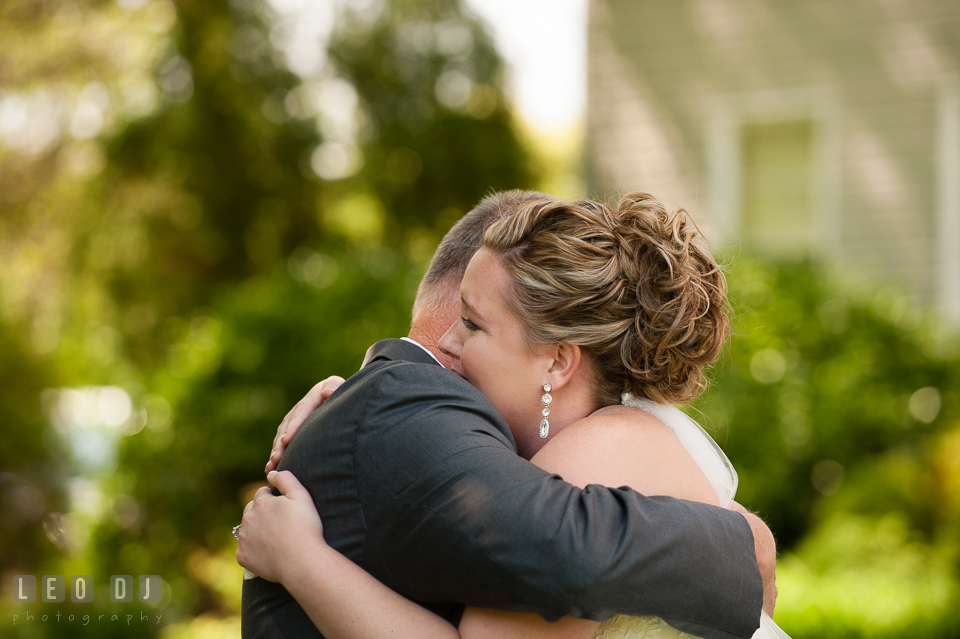 Bride hugging Father during first glance. Kent Manor Inn, Kent Island, Eastern Shore Maryland, wedding ceremony and getting ready photos, by wedding photographers of Leo Dj Photography. http://leodjphoto.com