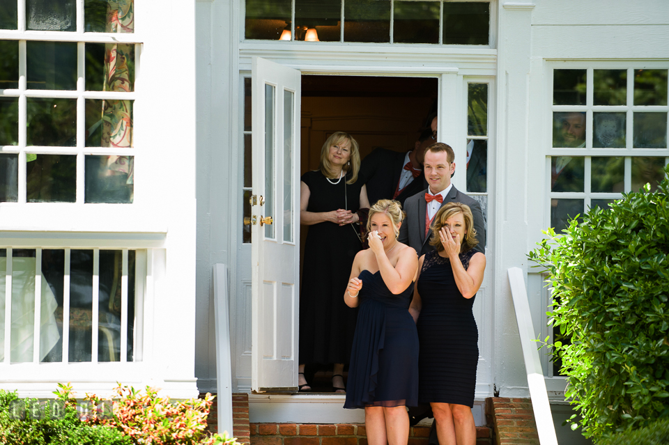 Bride's sister and Mother cried watching first look between father of the bride and daughter. Kent Manor Inn, Kent Island, Eastern Shore Maryland, wedding ceremony and getting ready photos, by wedding photographers of Leo Dj Photography. http://leodjphoto.com