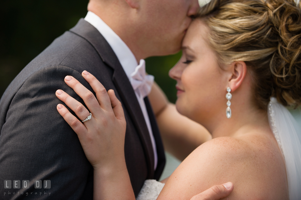 Groom kissing Bride's forehead. Kent Manor Inn, Kent Island, Eastern Shore Maryland, wedding ceremony and getting ready photos, by wedding photographers of Leo Dj Photography. http://leodjphoto.com