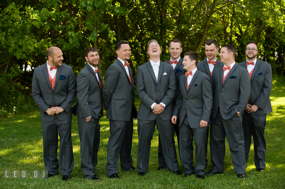 Groom laughing hard watched by the groom's party. Kent Manor Inn, Kent Island, Eastern Shore Maryland, wedding ceremony and getting ready photos, by wedding photographers of Leo Dj Photography. http://leodjphoto.com