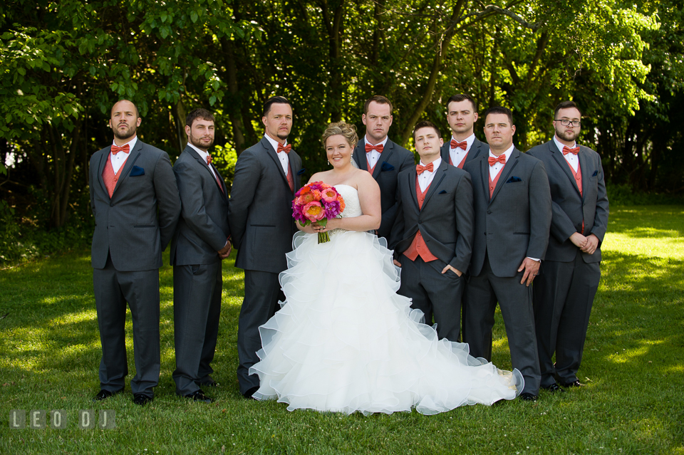 Bride posing together with the Best Man and Groomsmen. Kent Manor Inn, Kent Island, Eastern Shore Maryland, wedding ceremony and getting ready photos, by wedding photographers of Leo Dj Photography. http://leodjphoto.com