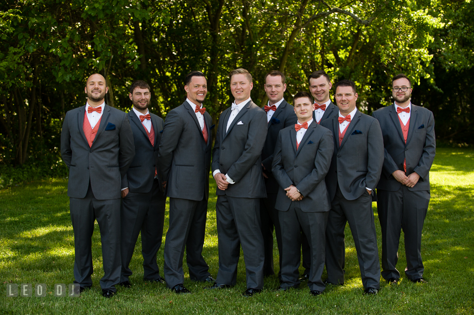 Groom posing together with Best Man and Groomsmen, wearing tux from Vera Wang. Kent Manor Inn, Kent Island, Eastern Shore Maryland, wedding ceremony and getting ready photos, by wedding photographers of Leo Dj Photography. http://leodjphoto.com