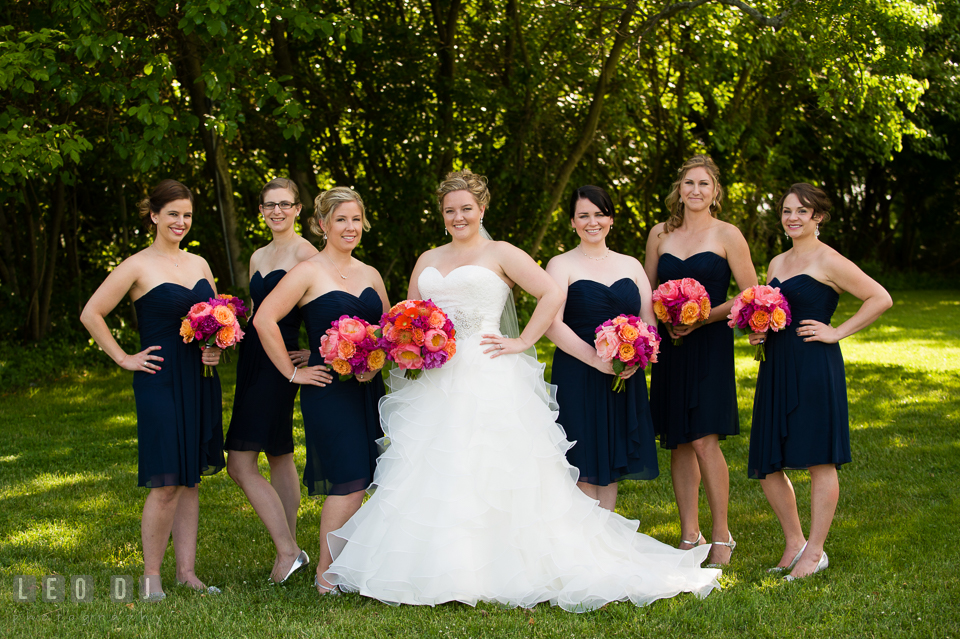 Bride posing together with Matron of Honor and Bridesmaids with their flower bouquets. Kent Manor Inn, Kent Island, Eastern Shore Maryland, wedding ceremony and getting ready photos, by wedding photographers of Leo Dj Photography. http://leodjphoto.com