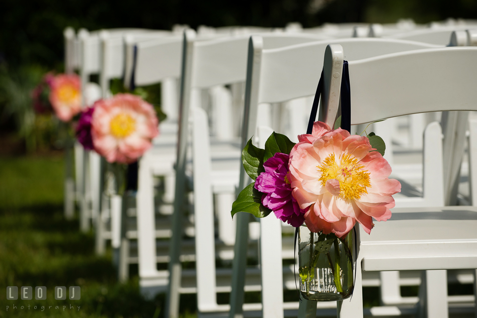 Bold and vibrant colored peonies flower decor on ceremony aisle designed by Intrigue Design and Decor. Kent Manor Inn, Kent Island, Eastern Shore Maryland, wedding ceremony and getting ready photos, by wedding photographers of Leo Dj Photography. http://leodjphoto.com