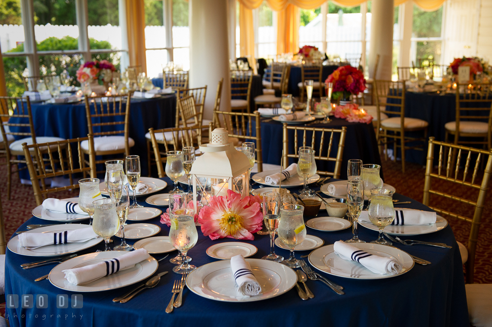 Table setting with large peonies and nautical lantern for the centerpiece by Intrigue Design and Decor. Kent Manor Inn, Kent Island, Eastern Shore Maryland, wedding reception and ceremony photo, by wedding photographers of Leo Dj Photography. http://leodjphoto.com