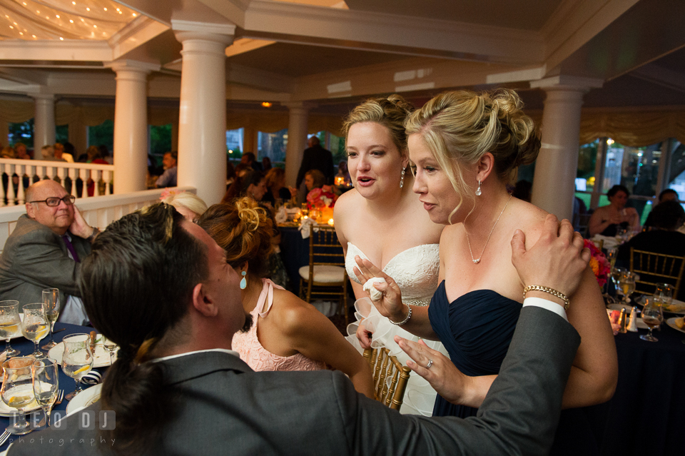 Bride and Matron of Honor complimented Groom for his speech. Kent Manor Inn, Kent Island, Eastern Shore Maryland, wedding reception and ceremony photo, by wedding photographers of Leo Dj Photography. http://leodjphoto.com