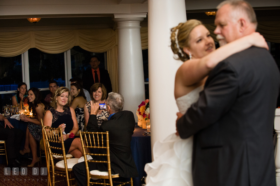 Mother of Bride seeing her husband and daughter dancing during the father-daughter dance. Kent Manor Inn, Kent Island, Eastern Shore Maryland, wedding reception and ceremony photo, by wedding photographers of Leo Dj Photography. http://leodjphoto.com