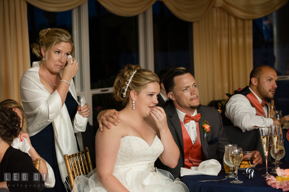 The teary-eyed Bride, her sister and the Groom's brother during the Mother and son. Kent Manor Inn, Kent Island, Eastern Shore Maryland, wedding reception and ceremony photo, by wedding photographers of Leo Dj Photography. http://leodjphoto.com