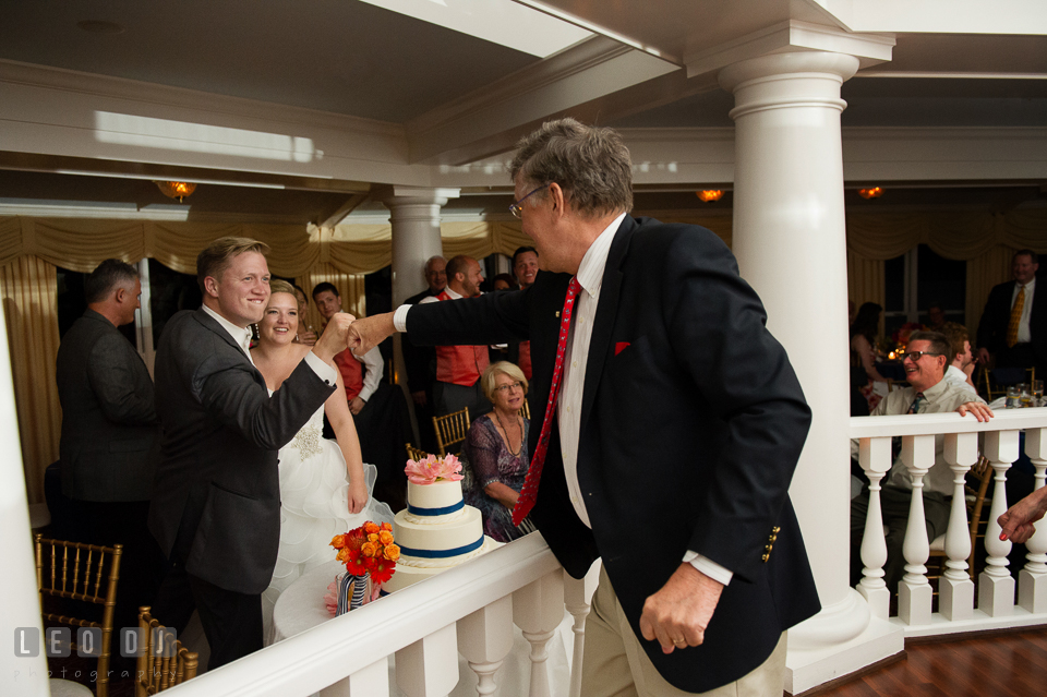 The Bride and Groom being congratulated by guests. Kent Manor Inn, Kent Island, Eastern Shore Maryland, wedding reception and ceremony photo, by wedding photographers of Leo Dj Photography. http://leodjphoto.com