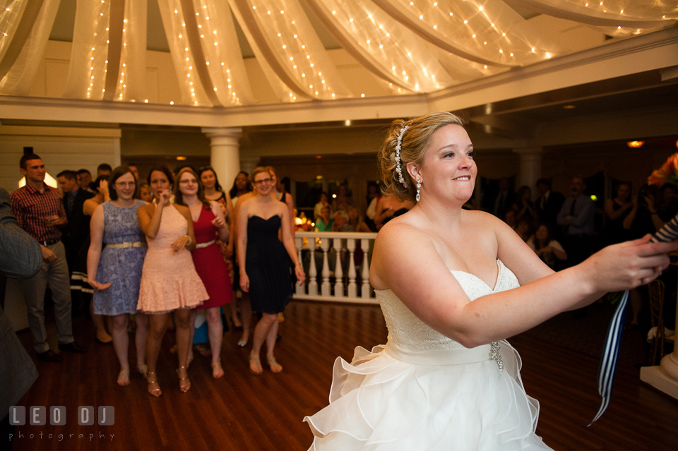 Bride getting ready to throw flower bouquet to the single ladies. Kent Manor Inn, Kent Island, Eastern Shore Maryland, wedding reception and ceremony photo, by wedding photographers of Leo Dj Photography. http://leodjphoto.com