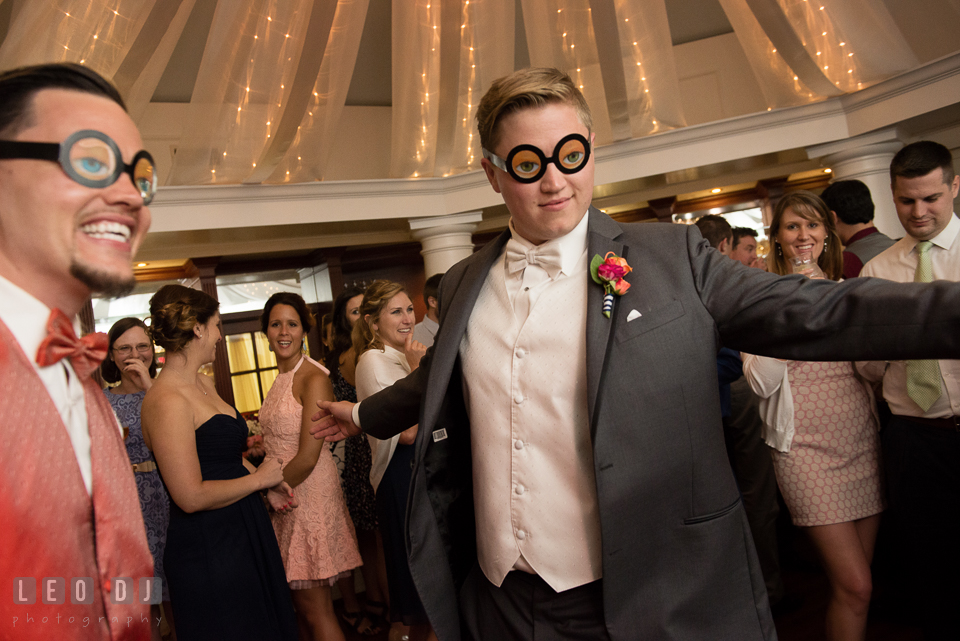 Groom and best man dancing with silly glasses. Kent Manor Inn, Kent Island, Eastern Shore Maryland, wedding reception and ceremony photo, by wedding photographers of Leo Dj Photography. http://leodjphoto.com