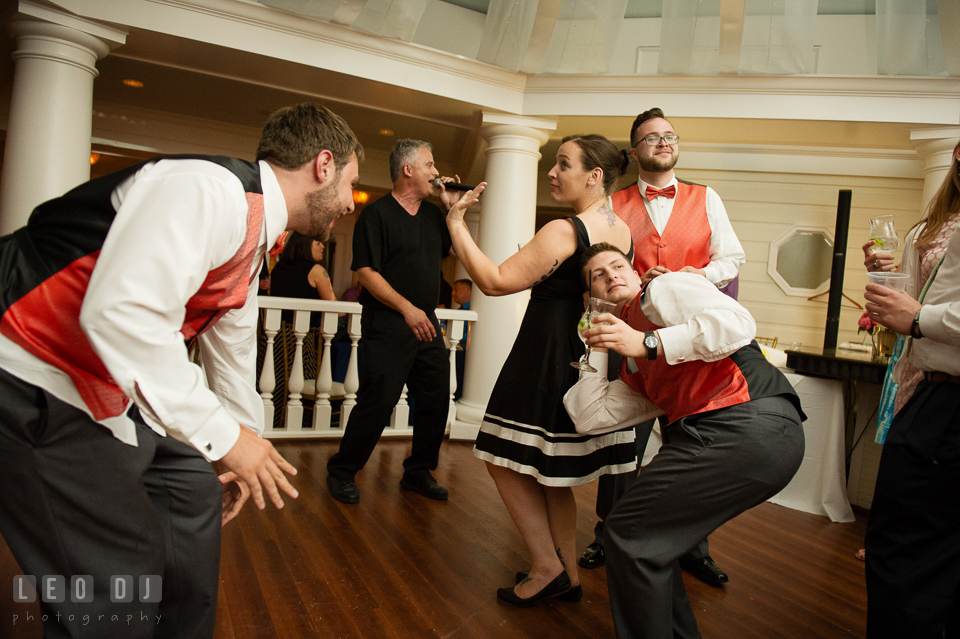 Groomsmen and guests dancing silly and having fun. Kent Manor Inn, Kent Island, Eastern Shore Maryland, wedding reception and ceremony photo, by wedding photographers of Leo Dj Photography. http://leodjphoto.com