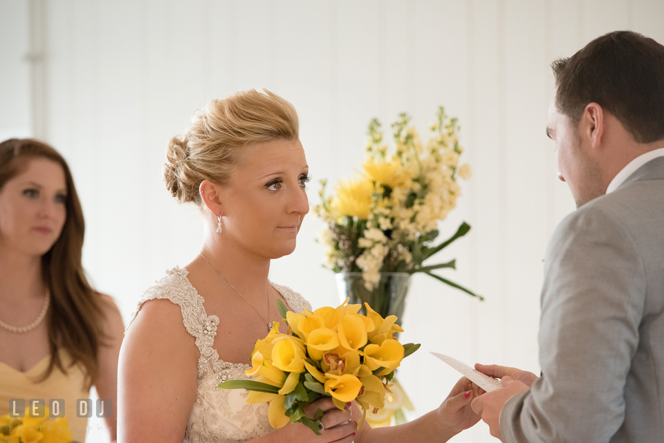 Bride crying listening to vows read by the Groom. Maryland Yacht Club wedding at Pasadena Maryland, by wedding photographers of Leo Dj Photography. http://leodjphoto.com