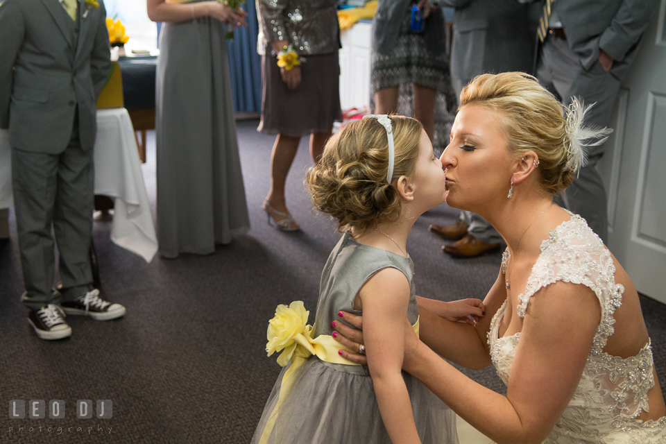 Bride kissing her daughter. Maryland Yacht Club wedding at Pasadena Maryland, by wedding photographers of Leo Dj Photography. http://leodjphoto.com