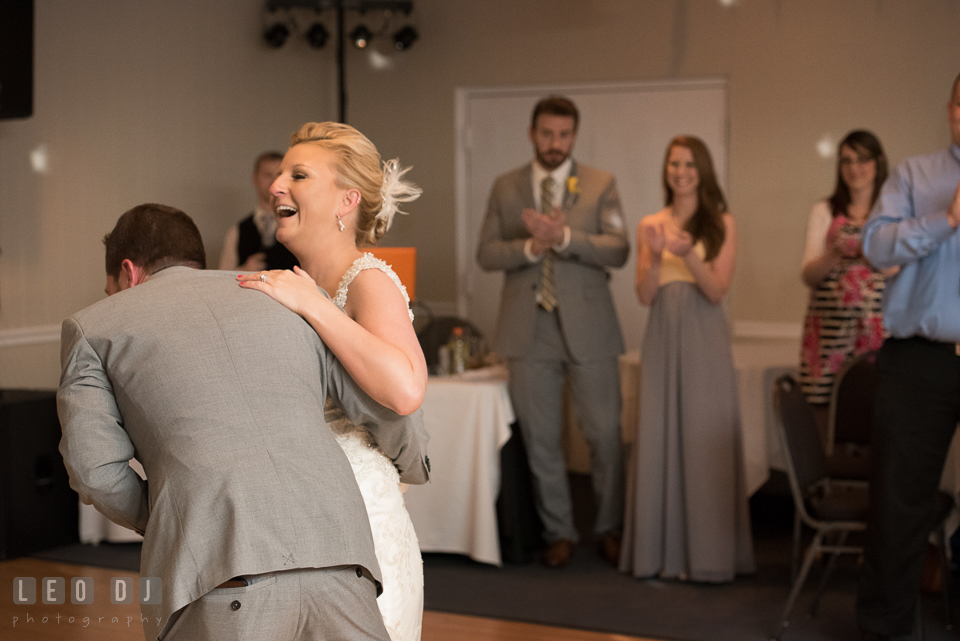 Bride and Groom laughing during their first dance. Maryland Yacht Club wedding at Pasadena Maryland, by wedding photographers of Leo Dj Photography. http://leodjphoto.com