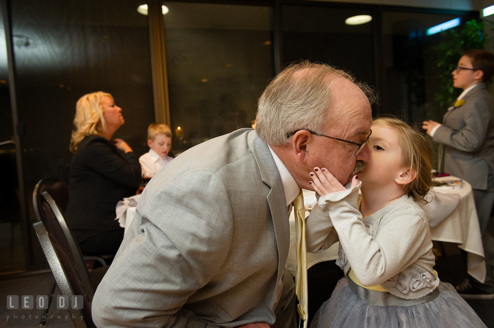 Father of the Bride kissed by his granddaughter. Maryland Yacht Club wedding at Pasadena Maryland, by wedding photographers of Leo Dj Photography. http://leodjphoto.com