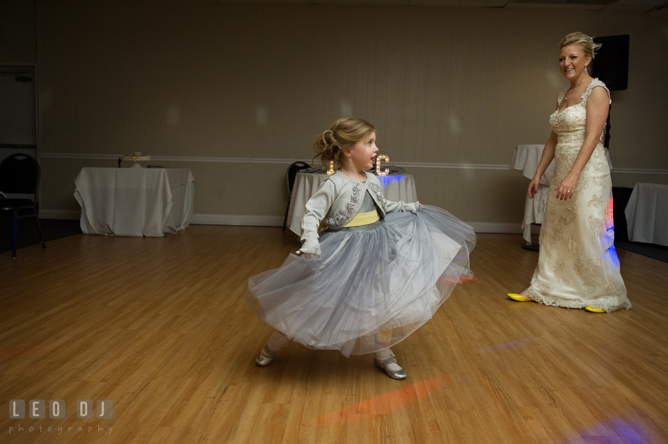 Flower girl dancing to the song  "Let It Go" from the Disney animate movie "Frozen". Maryland Yacht Club wedding at Pasadena Maryland, by wedding photographers of Leo Dj Photography. http://leodjphoto.com