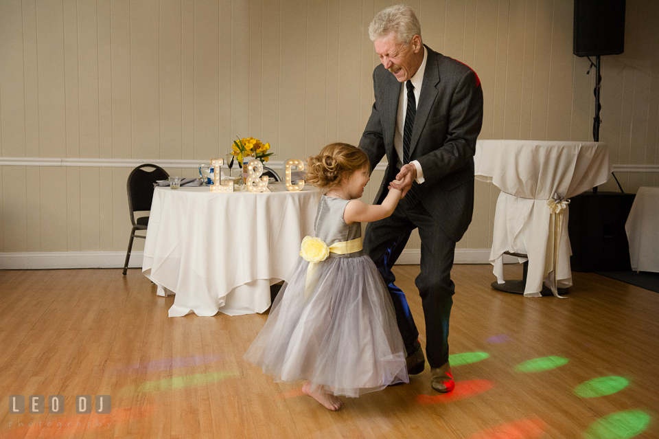 Flower girl dancing with her Uncle. Maryland Yacht Club wedding at Pasadena Maryland, by wedding photographers of Leo Dj Photography. http://leodjphoto.com