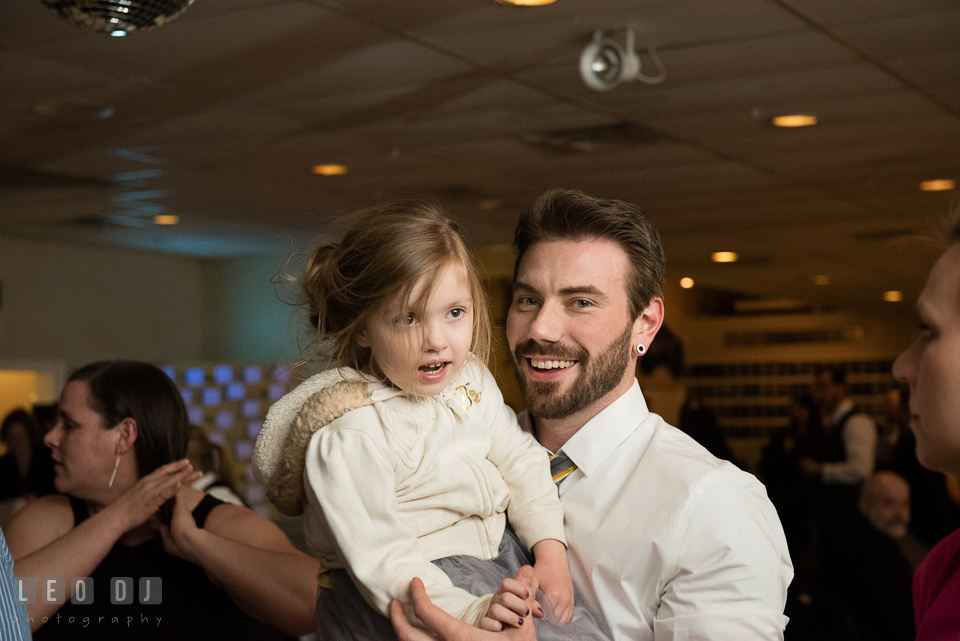 Flower girl dancing with the Best Man. Maryland Yacht Club wedding at Pasadena Maryland, by wedding photographers of Leo Dj Photography. http://leodjphoto.com