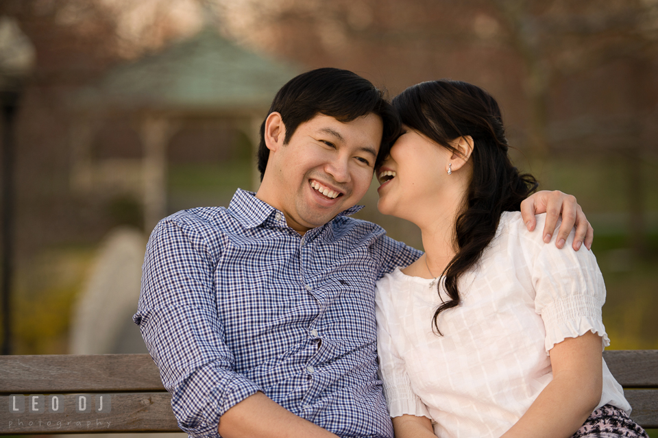 Engaged couple embracing and laughing together. Quiet Waters Park Annapolis Maryland pre-wedding engagement photo session, by wedding photographers of Leo Dj Photography. http://leodjphoto.com