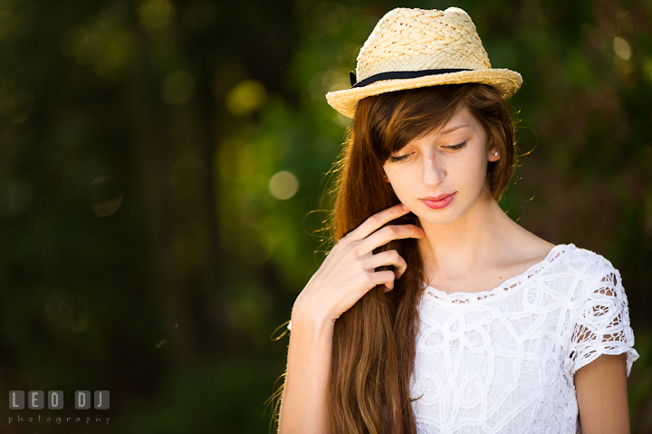 Beautiful girl with hat playing her long hair. Easton, Centreville, Maryland, High School senior portrait session by photographer Leo Dj Photography. http://leodjphoto.com