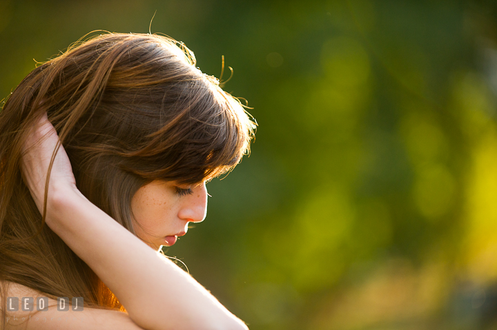 Pretty girl playing with her hair. Easton, Centreville, Maryland, High School senior portrait session by photographer Leo Dj Photography. http://leodjphoto.com