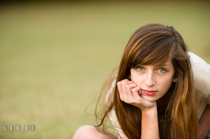 Pretty girl sitting and smiling. Easton, Centreville, Maryland, High School senior portrait session by photographer Leo Dj Photography. http://leodjphoto.com