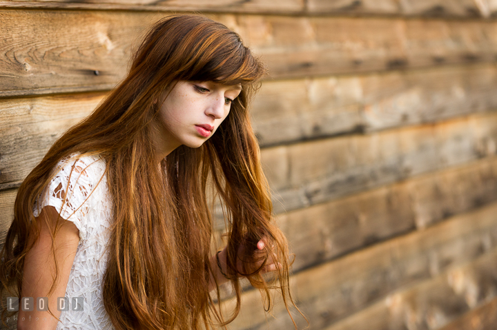 Beautiful girl playing with long hair. Image featured on Photo Vogue Italia web site. Easton, Centreville, Maryland, High School senior portrait session by photographer Leo Dj Photography. http://leodjphoto.com