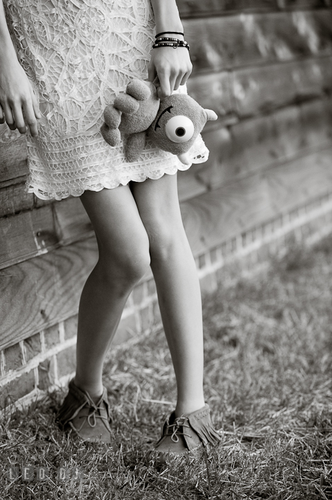 Close up shot of stuffed toy Mike Wazowski from Monsters Inc movie. Eastern Shore, Maryland, High School senior portrait session by photographer Leo Dj Photography. http://leodjphoto.com