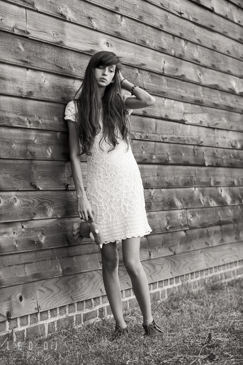 Gorgeous girl in white dress holding stuffed toy Mike Wazowski from Monsters Inc movie. Eastern Shore, Maryland, High School senior portrait session by photographer Leo Dj Photography. http://leodjphoto.com