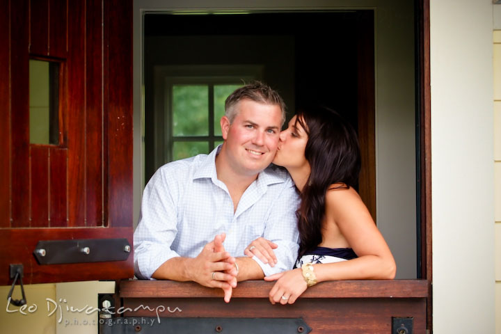 engaged girl kissed her fiance's cheek. Kent Island, Eastern Shore, Maryland Engagement Pre-wedding photography session