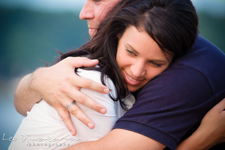 engaged girl is being hugged and cuddled by her fiancee. Kent Island, Eastern Shore, Maryland Engagement Pre-wedding photography session
