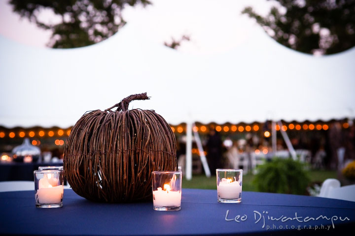 Wooden pumpkin and candles for table decorations. Annapolis Kent Island Maryland Wedding Photography with live dance band at reception